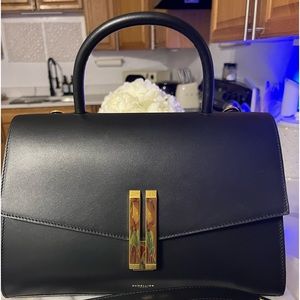 DEMILLIER London (The Montreal Bag) in black smooth.